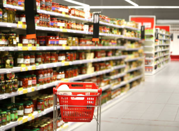 istock empty grocery cart in an empty supermarket 1386051354