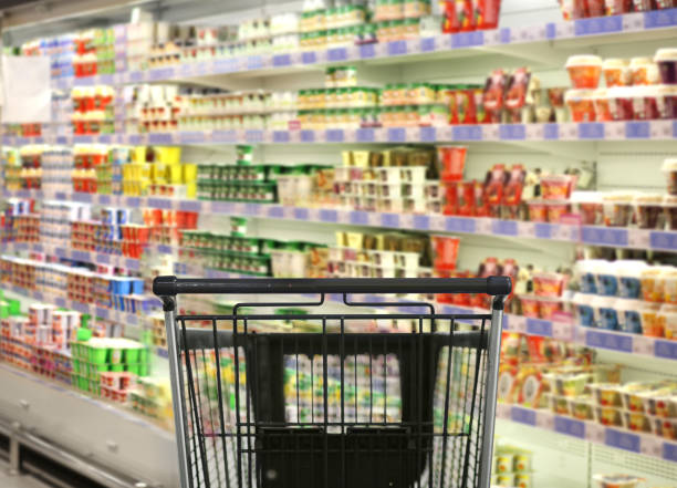 istock empty grocery cart in an empty supermarket 1386051364
