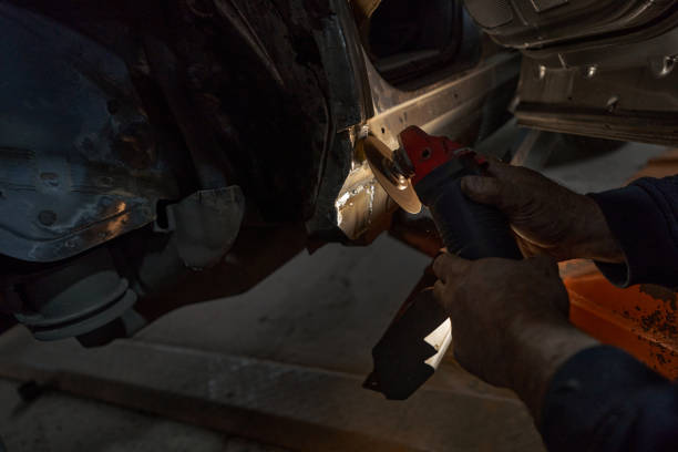 istock Man repairing car and working with tool 1386052721