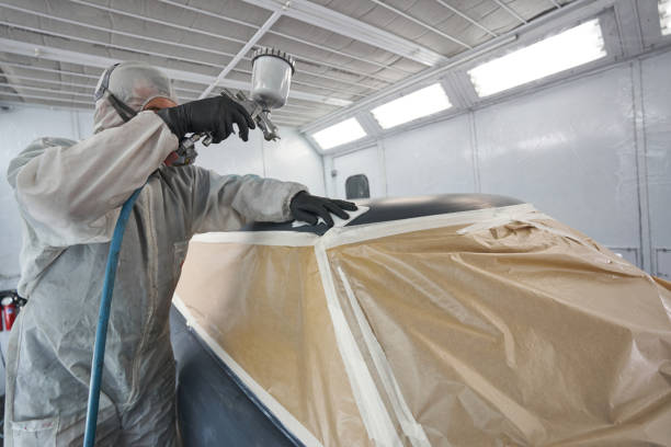 istock Process of man work in workshop during painting 1386052739