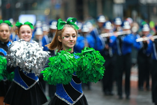 New York, New York - March 17, 2022: Members of the North Babylon High School in the St. Patrick's Day Parade, March 17, 2022, in New York.