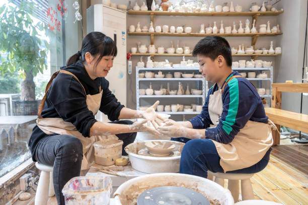 istock Mother and boy make ceramics at home 1386077979