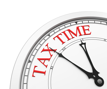 Tax time deadline on a clock