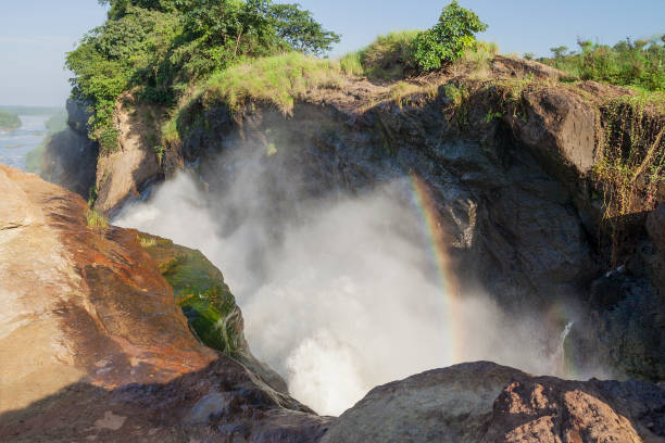 istock Rainbow and spray at the top of Murchison Falls, Uganda 1386082453