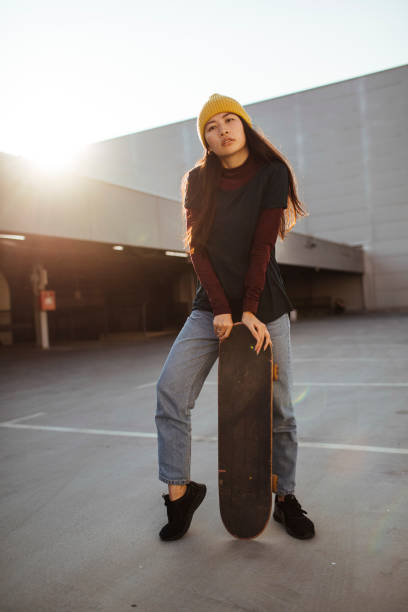istock Girl and skateboard 1386082758