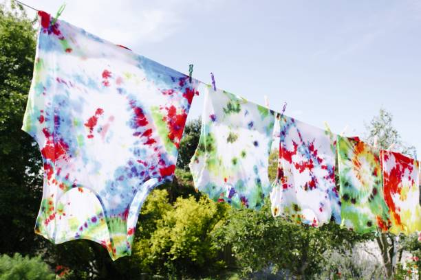 istock Tie-Dye T-Shirts on Washing Line 1386085034