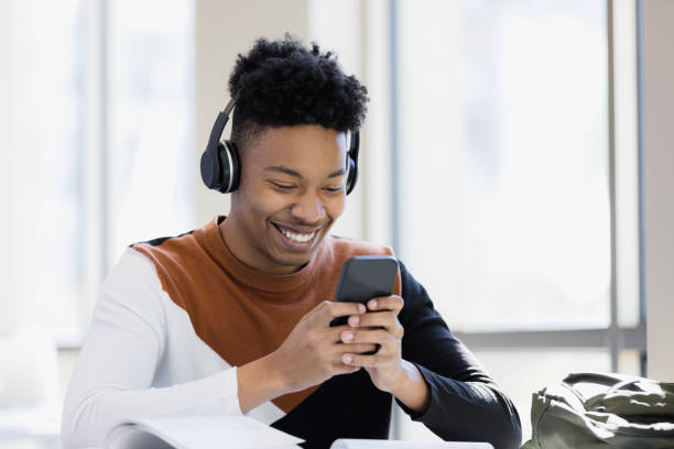 istock High school student text messages on phone instead of working 1386085786