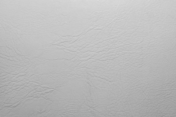istock Texture photo of white colored leather. 1386092297