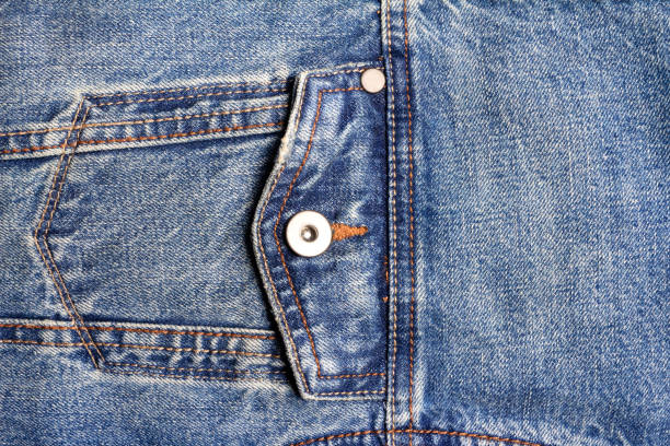 istock Texture backdrop photo of blue colored denim cloth. 1386094535