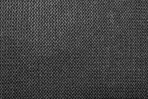 istock Knitted fabric cloth texture backdrop photo. 1386094551