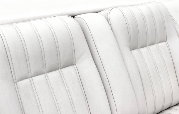 istock Retro white colored car leather seats. 1386097138