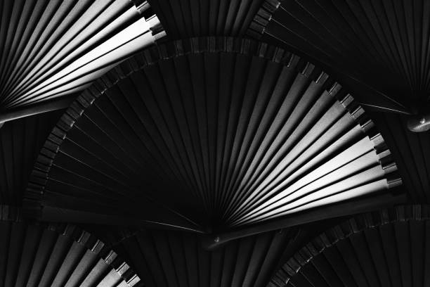 Seamless photo of black wooden folding fan pattern. stock photo