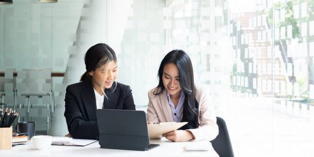 istock Group of Businesswoman and Accountant checking data document on digital tablet for investigation of corruption account. Anti Bribery concept. 1386098651