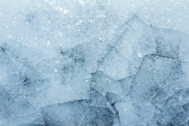 istock Cracked frozen ground texture background. 1386098804