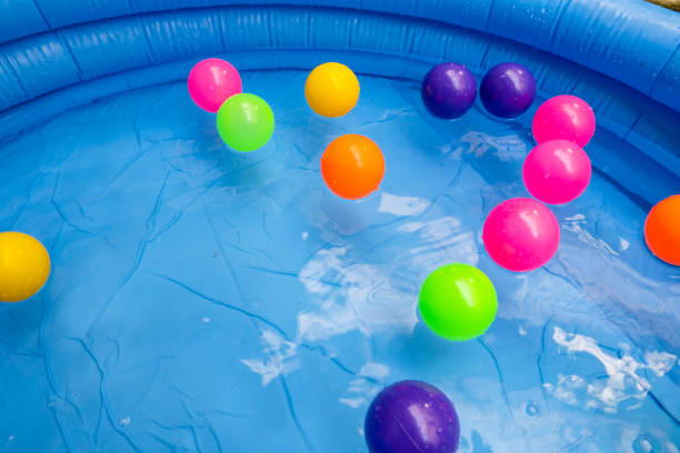 istock Colorful balls on portable swimming pool 1386114080