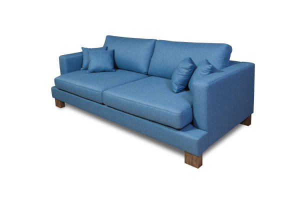 istock Sofa made of blue fabric isolated on a white background 1386116532