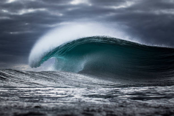 istock Strong, dark ocean wave forming out at sea 1386132052