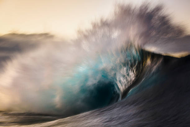 istock Blurred motion of large crashing ocean wave 1386135744