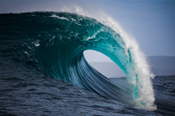 istock Perfect form of teal blue ocean wave 1386137394