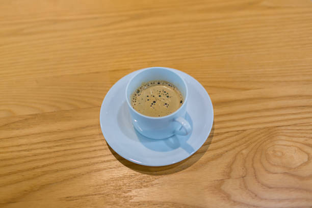 black drip coffee in glass cup. cup of espresso coffee. white cup of black coffee on  wooden desk or table. - 16607 imagens e fotografias de stock
