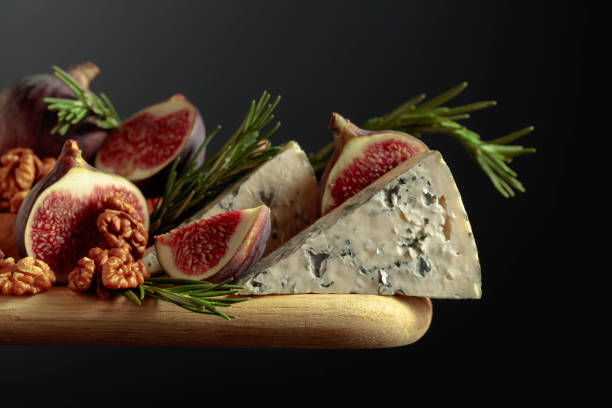 istock Blue cheese with figs, walnuts, and rosemary. 1386161532