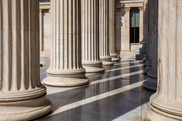 istock Column pillar white marble. Athens Greece Academy neoclassical building entrance colonnade. 1386166366