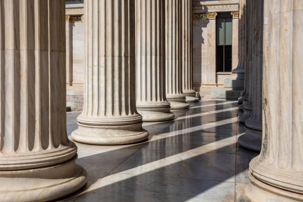 Column pillar white marble. Athens Greece Academy neoclassical building entrance colonnade. Classic columns pillars white marble. Athens Greece Academy neoclassical building entrance colonnade. Classical pillars in a row. natural column stock pictures, royalty-free photos & images