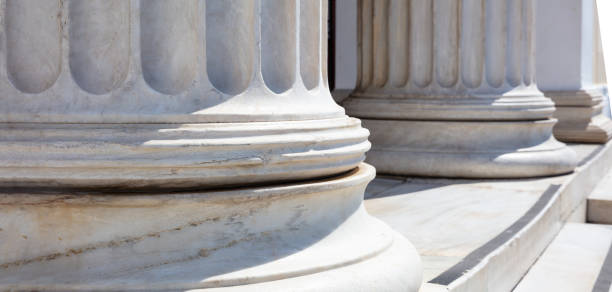 istock Pillar and stair white marble. Classical Ancient Greek column row, architecture detail. close up 1386166404