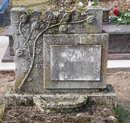 Old ornate tombstone in the public cemetery