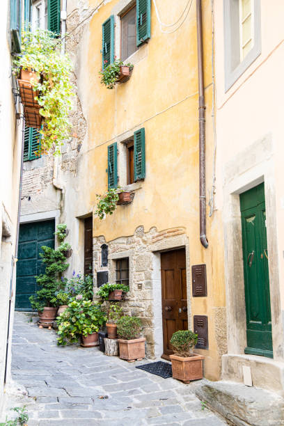 istock Narrow streets with colourful window boxes in Europe 1386172185
