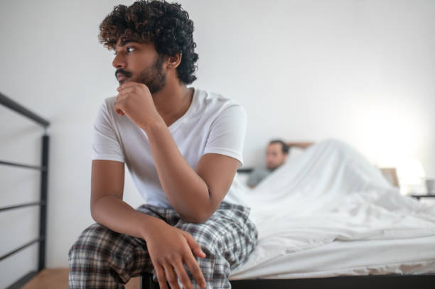 istock Dejected young male suffering from the break-up 1386172340