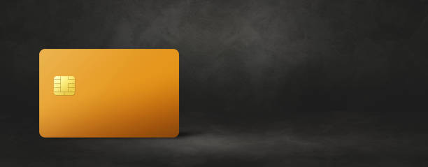 istock Yellow credit card on a black concrete background 1386173737