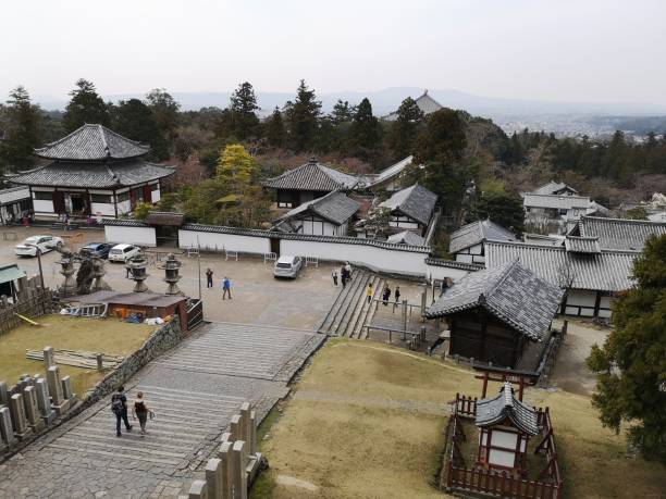 Kyoto, Japan - March 27, 2019:  view of tourists in Nara park from Todaiji Nigatsudo