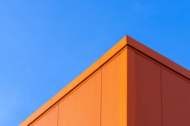 Low Angle View Of Building Against Clear Blue Sky