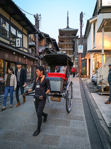 27 march 2019 - Kyoto, Japan: Classic antique vintage retro rickshaw trishaw or bicycle cart for japanese people and foreign travelers use service journey travel visit Gion in Kyoto