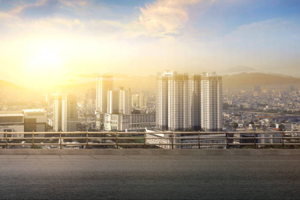 istock Asphalt road with modern building and skyscrapers 1386186990