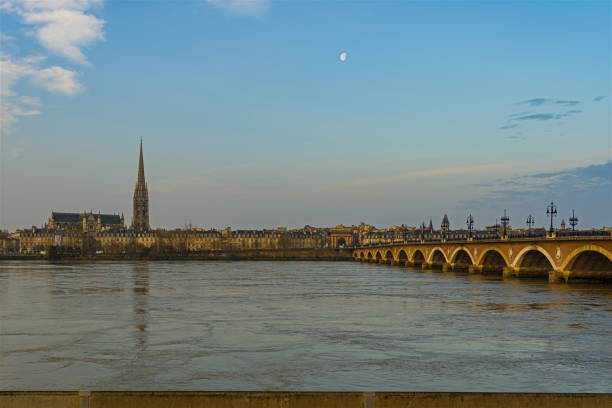 istock Sunrise on Bordeaux with its Stone Bridge its Tramway and its Saint-Michel Basilica since Docks 1386191207