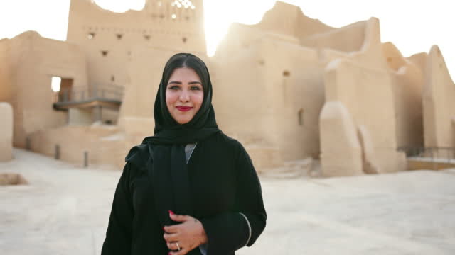 Portrait of late 30s Middle Eastern woman, At-Turaif ruins