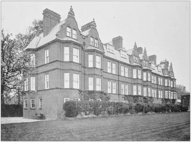 istock Antique vintage black and white photo: British countryside house 1386194879