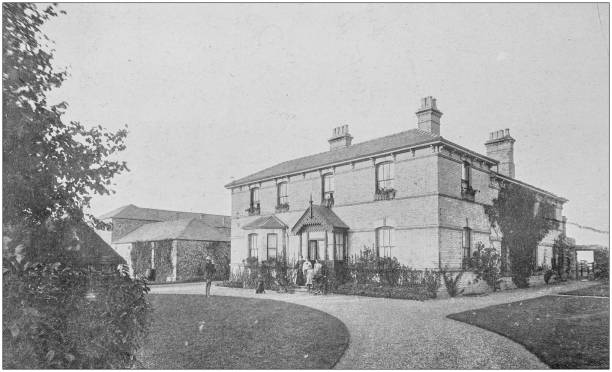 istock Antique vintage black and white photo: British countryside house 1386194951