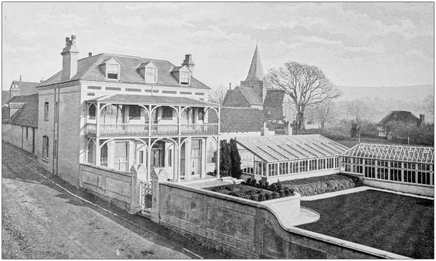 istock Antique vintage black and white photo: British countryside house 1386194994
