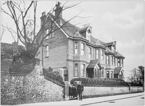 istock Antique vintage black and white photo: British countryside house 1386195015