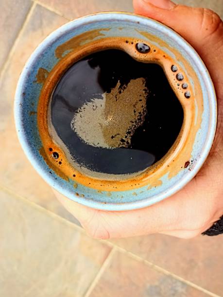 istock Photograph of a craft mug with coffee 1386200572