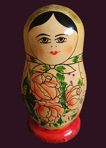 Russian doll on neutral background