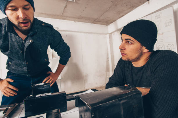 istock Stealers talking and planning a heist 1386207119