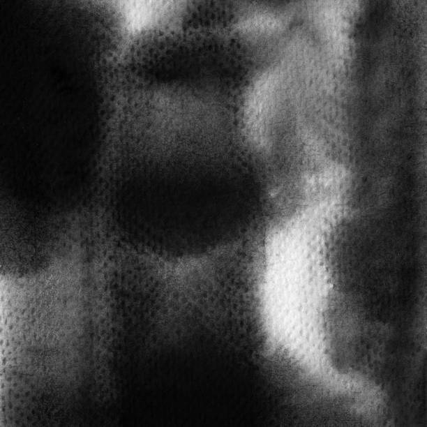 istock Black ink wash watercolor background as square close up paint texture 1386210232