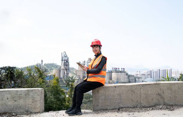 istock Asian female engineer in cement factory 1386212996