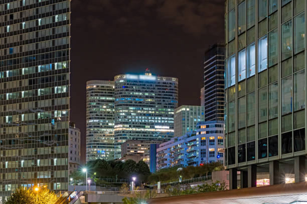 istock Differents Perspectives at La Defense Business District at Night Lights Clouds 1386214280