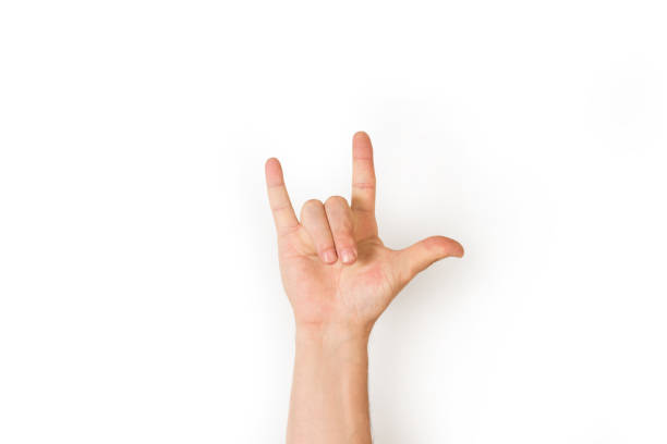 istock Man hand doing love gesture in sign language on a white background 1386214757