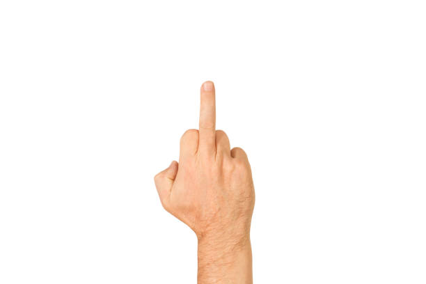 istock Man hand doing offensive gesture with the middle finger on a white background 1386214765
